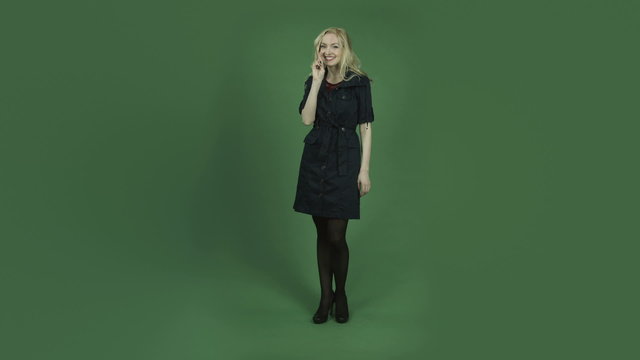 caucasian woman in blue dress isolated on chroma green screen