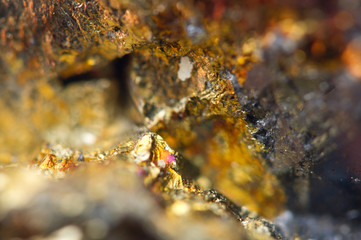 Fantastic background, magic of a stone, gold metal
