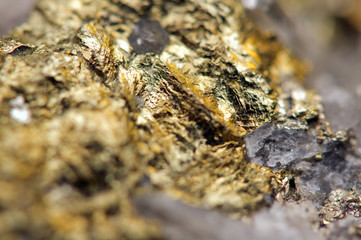 Fantastic background, magic of a stone, gold metal