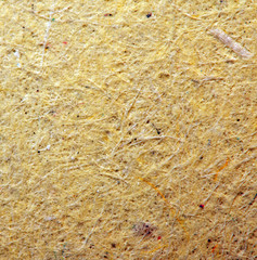 Yellow paper background. Macro. Extreme closeup. Ordinary paper