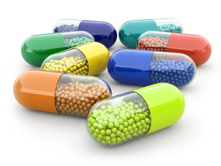 Pills and drugs on white isolated bacground. Medical concept.