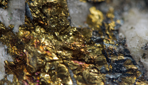 Crystal, gold, bronze, copper, iron. Macro.