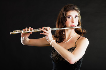 Art. Woman flutist flaustist musician playing flute