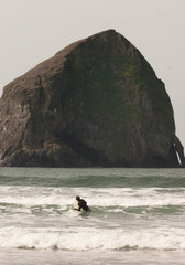 Surfer Tries Catching Small Wave Rocky Butte Pacific Ocean