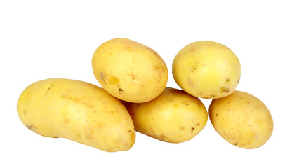 Heap of yellow raw potatos