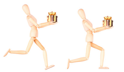 wooden Dummy holding gift with ribbon