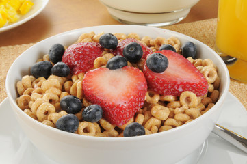 Cold cereal with strawberries and blueberries