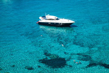 luxury yacht in turquoise Illetes Formentera mediterranean sea B
