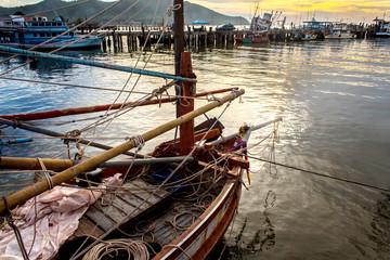 Fisherman ship and boat in harbor