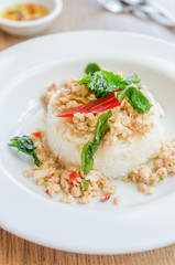 Spicy fried chicken with basil and rice
