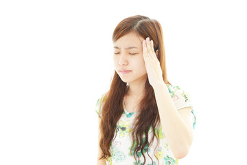 頭痛を訴える女性