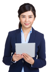 Business woman holding tablet