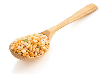 pea grain and wooden spoon