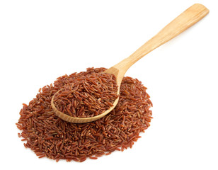 rice in wooden spoon on white