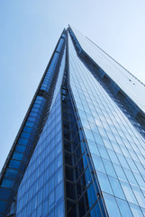 Obraz na płótnie Canvas The Shard of Glass, London, against blue sky
