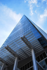 The Shard of Glass tower with canopy against blue sky