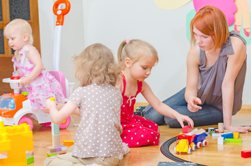 Kids playing in kindergarten.