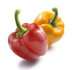 Red and yellow bell pepper isolated on white background