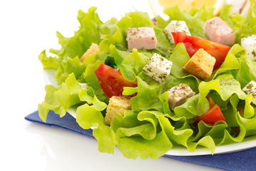 salad in plate on white