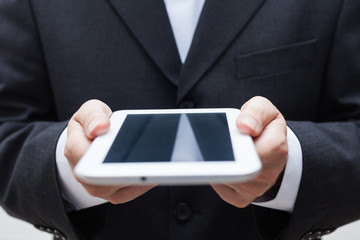 Businessman with digital tablet