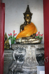 Buddha behind doors