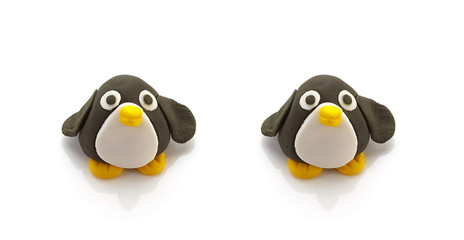 two penguin doll on white background