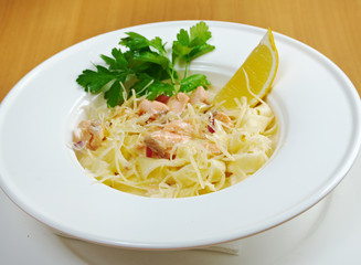 Pasta fettuccine with salmon