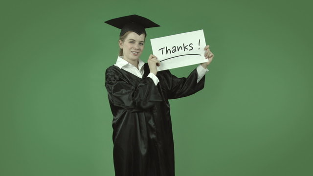 attractive caucasian graduate student isolated on green grateful