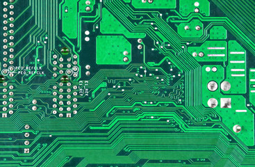 Close up of a printed green computer circuit board