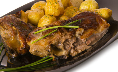 Cordero con patatas.