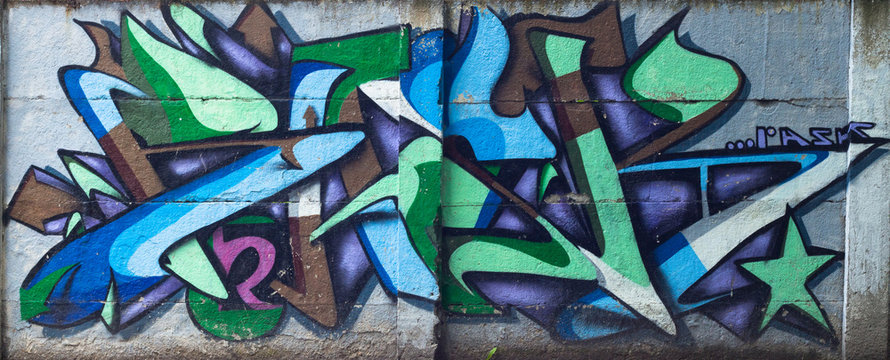 Colorful graffity on the wall in the centre of the town