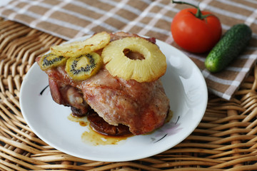 roasted turkey meat with pineapple and kiwi