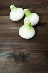 Onion on wooden desk