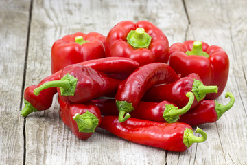 red peppers on wooden background
