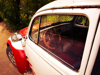 Side view of red retro car
