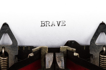 Typewriter with text brave - 65678408