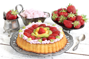 homemade cake with strawberry and whipped cream