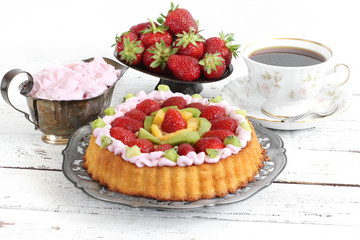 homemade cake with strawberry and whipped cream