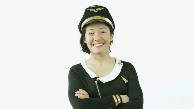 air hostess isolated on white smiling confident arms crossed