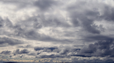One day it will be sunny, but today there are ragged gray clouds in the sky