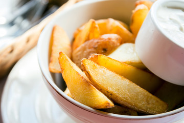 Fried potato wedges