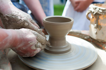 Pottery - formation process of the clay dish with traditional me