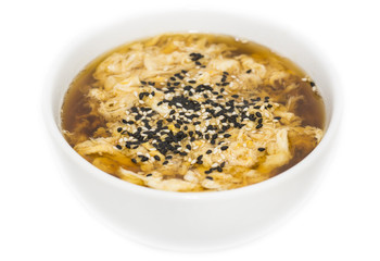 Japanese soup with mushrooms and beef on white background