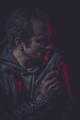 Weapon, secret agent with gun and red light