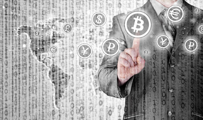 Choosing bitcoins, businessman pressing touch screen button.