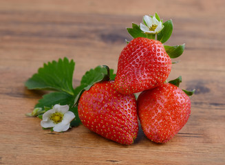 Strawberries in red heart shape bowl