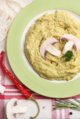 Bowl of tasty fresh hummus, close up