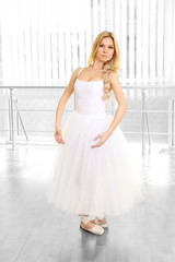 Beautiful balerina dancing in ballet class © Africa Studio