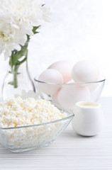 Tasty dairy products on wooden table