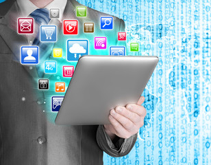 Business man use tablet pc with colorful application icons